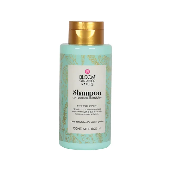 Botella verde menta de shampoo Bloom Organics Nature con aceites esenciales, tapa dorada, 500 ml.